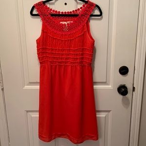 Bright salmon colored max studio dress